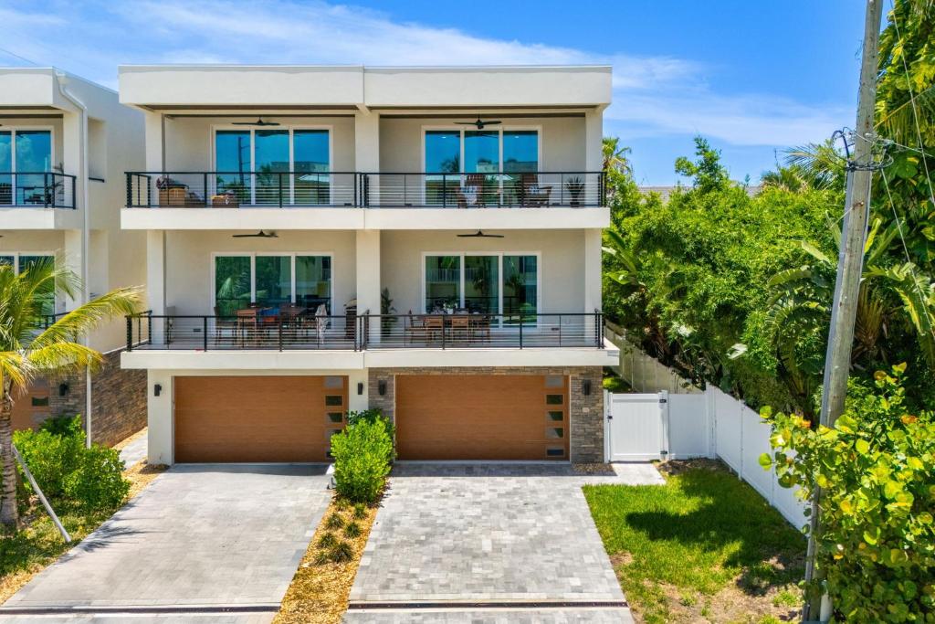 an aerial view of a house with a balcony at 40 8th Avenue in Indialantic