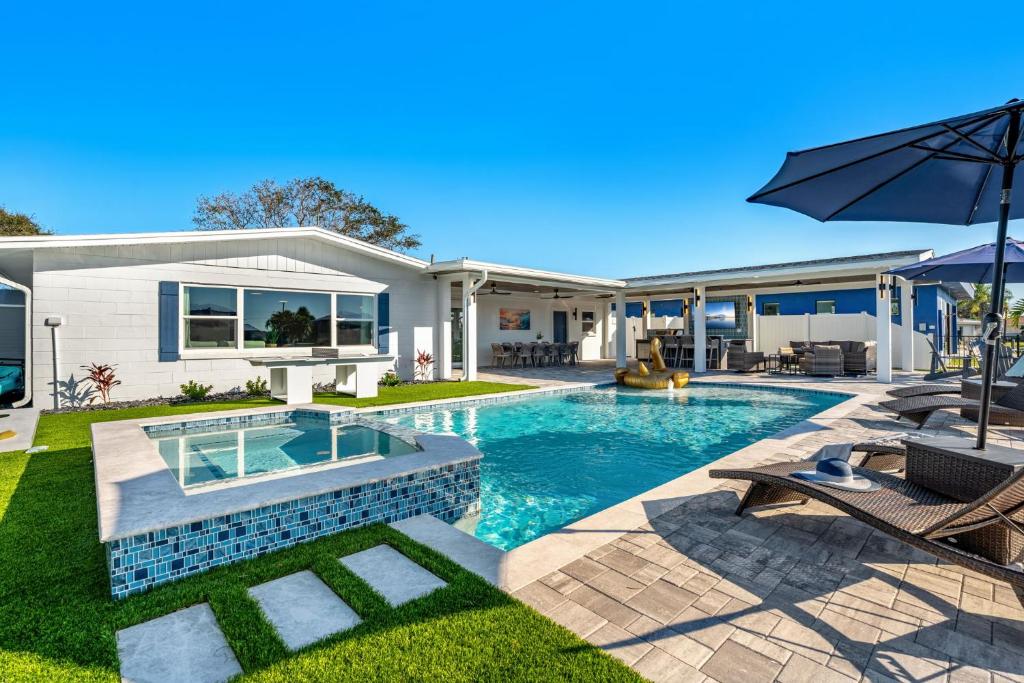 a swimming pool in the backyard of a house at 126 Deleon Rd in Cocoa Beach