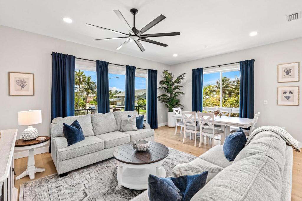 a living room with a couch and a table at 50 8th Avenue in Indialantic