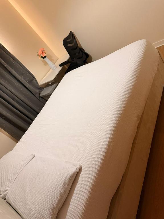 a close up of a bed in a room at Springfield garden-Celtic park in Glasgow