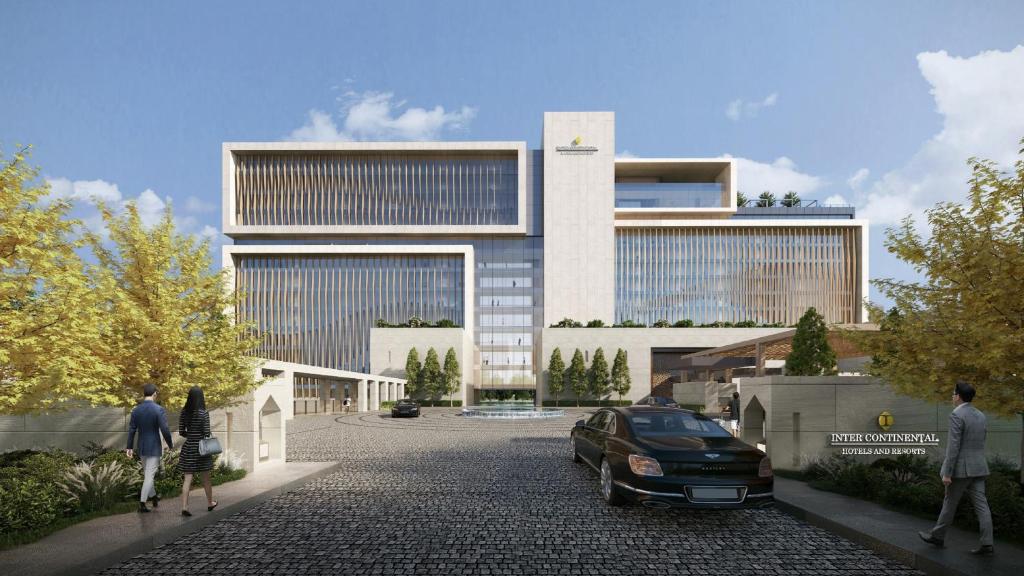 a rendering of a building with a car parked in front at InterContinental Yining by IHG in Yining