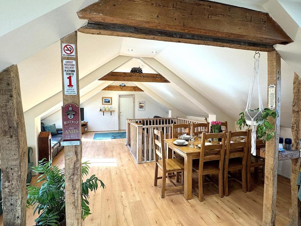 a kitchen and dining room with a table and chairs at 3 Bed in Braunton oc-86704 in Braunton