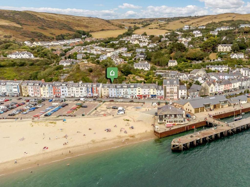 an aerial view of a beach with a town at 2 Bed in Aberdyfi oc-dy044 in Aberdyfi