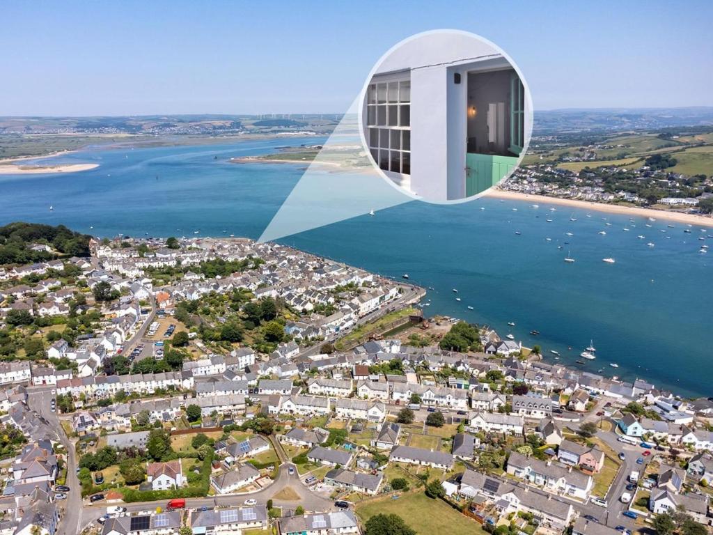 a rendering of a building next to a body of water at 2 Bed in Bideford oc-52863 in Appledore