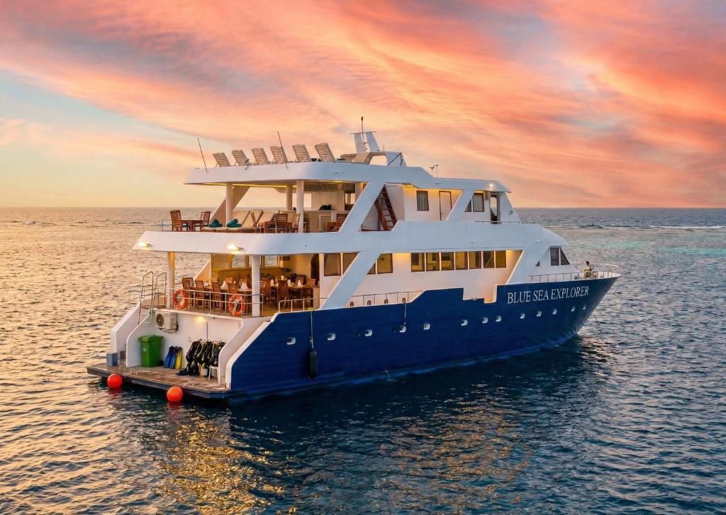 a cruise ship in the water at sunset at Blue Sea Explorer in Male City