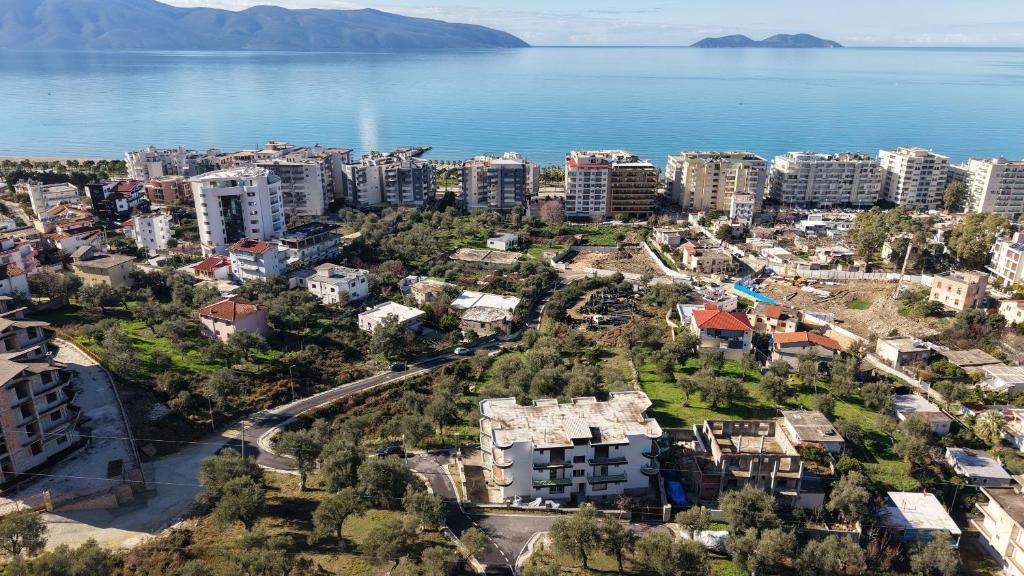 an aerial view of a city next to the water at Olivet Hotel in Vlorë
