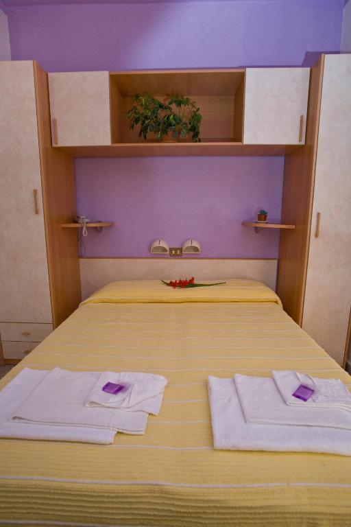Postel nebo postele na pokoji v ubytování Hotel Moja