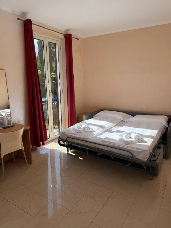 Hotel Villa Flora - Chambre Quadruple Confort