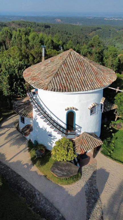 an aerial view of a building with a roof at O Moinho de Vale da Mó in Anadia