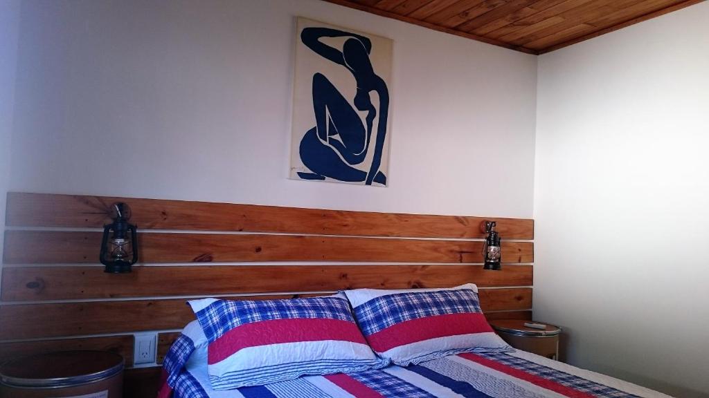 Postel nebo postele na pokoji v ubytování Cabañas 57
