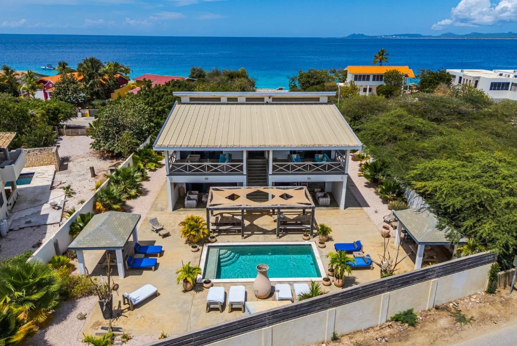 an aerial view of a house with a swimming pool at Vista Alegre by Boutique Bonaire Unique Resorts in Kralendijk