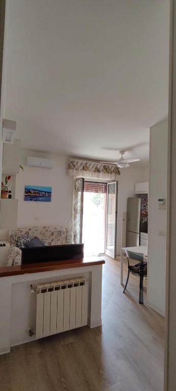 a kitchen with a counter top in a room at Casa Martina in Cogoleto