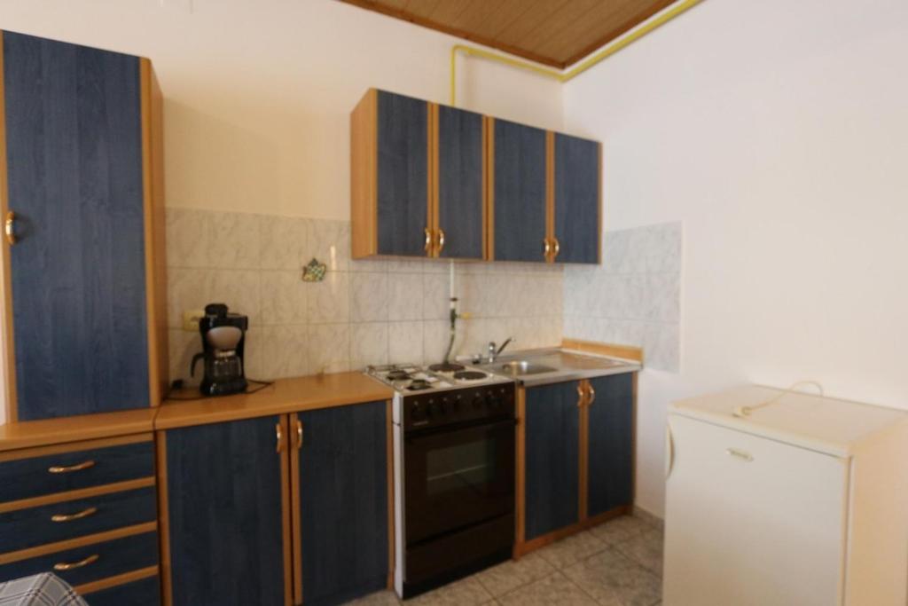 Kuchyňa alebo kuchynka v ubytovaní Apartment in Silo with Two-Bedrooms 7