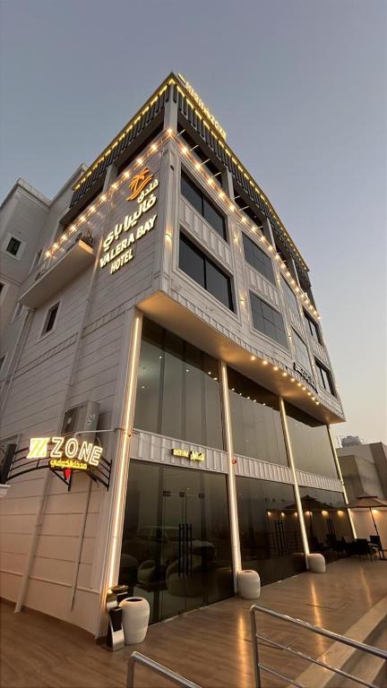 a building with a sign on the side of it at فندق فاليرا باي - محايل عسير VALERA BAY Hotel in Muhayil