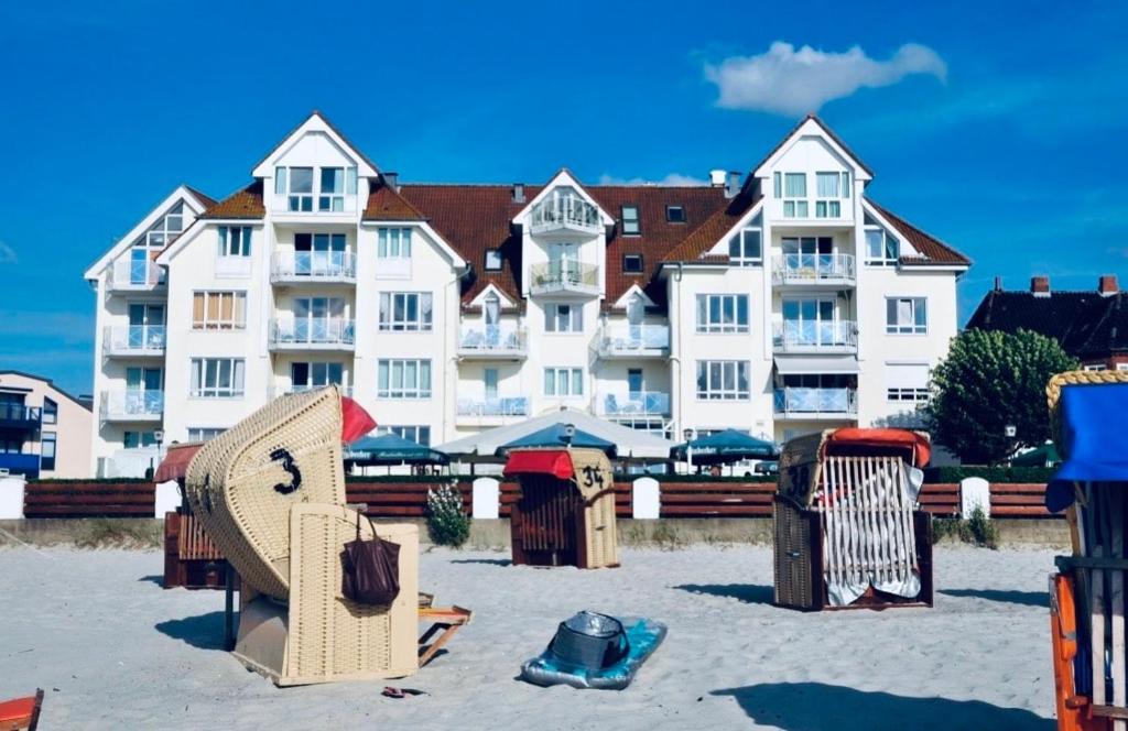 a large building on the beach with volley ball courts at Ocean View Laboe in Laboe