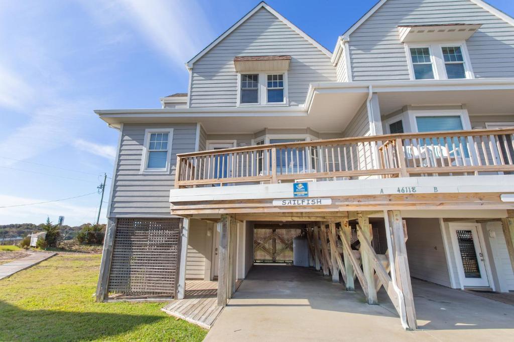 a large house with a large deck on it at CAC-17A - Sailfish in Buxton
