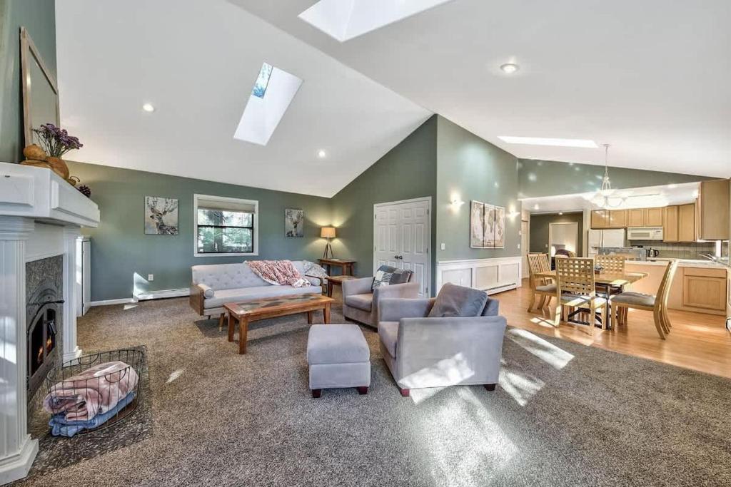 a living room with a couch and a fireplace at Minnow's Run in Kings Beach