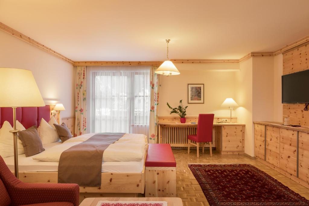 Postel nebo postele na pokoji v ubytování Gasthof Murtalerhof