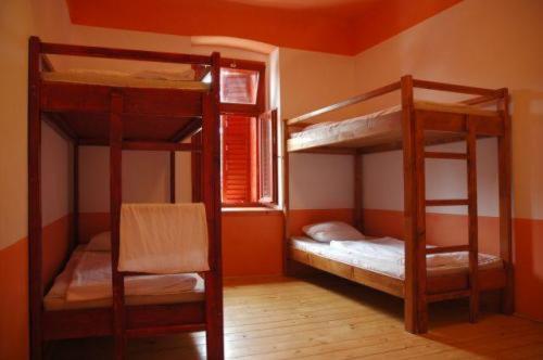 Postel nebo postele na pokoji v ubytování Hullam Hostel