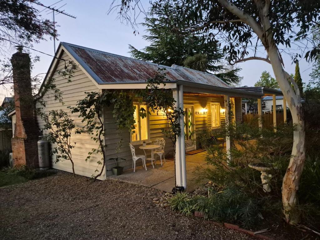 a small house with a pitched roof at Finchy Cottage in Beechworth