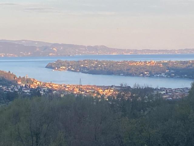 a view of a city and a body of water at La Terasa del Cichino in Roe