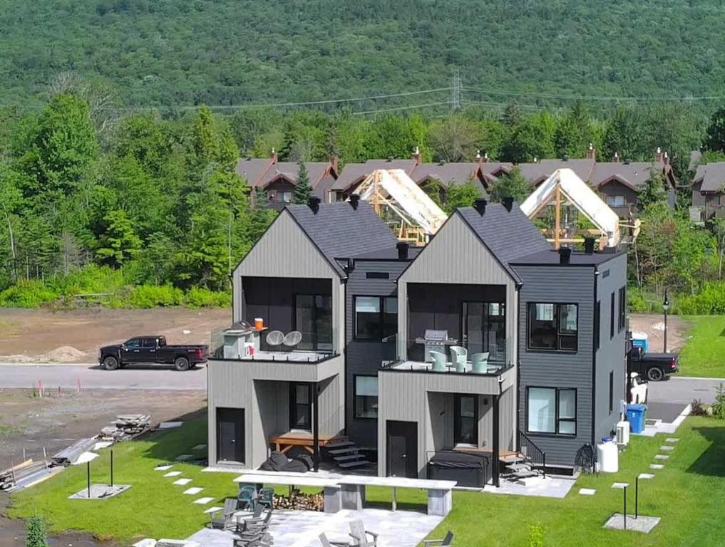 a large house is being built on a street at Mountain View - World Cup in Beaupré