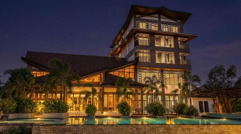 a large building with a lot of windows at Brio de Agoho Zambales by Cherry in Candelaria