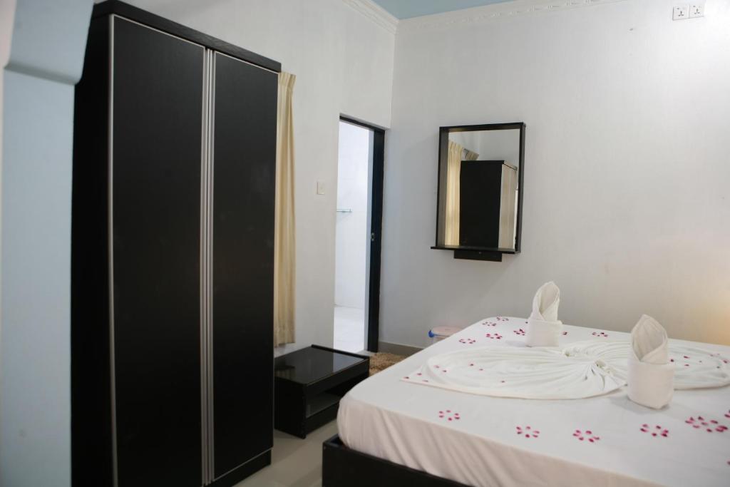 Postel nebo postele na pokoji v ubytování Azoush Tourist Guesthouse