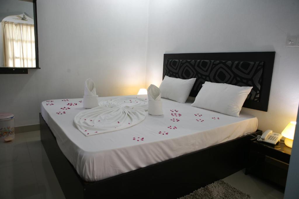Postel nebo postele na pokoji v ubytování Azoush Tourist Guesthouse