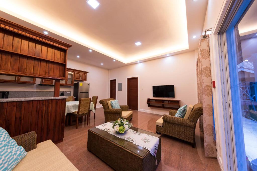 TV a/nebo společenská místnost v ubytování 71% Diving Resort