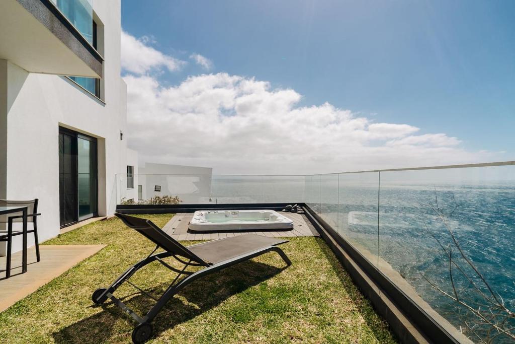 a view of the ocean from the balcony of a house at GuestReady - Stay with stunning views in Santa Cruz