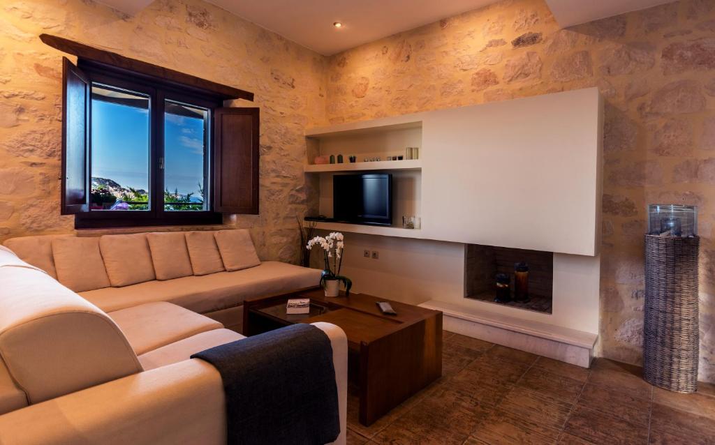 Χώρος καθιστικού στο Exensian Villas & Suites 