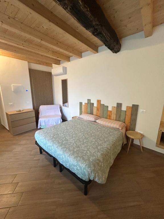 a bedroom with two beds in a room at Antica trave in Provaglio d'Iseo