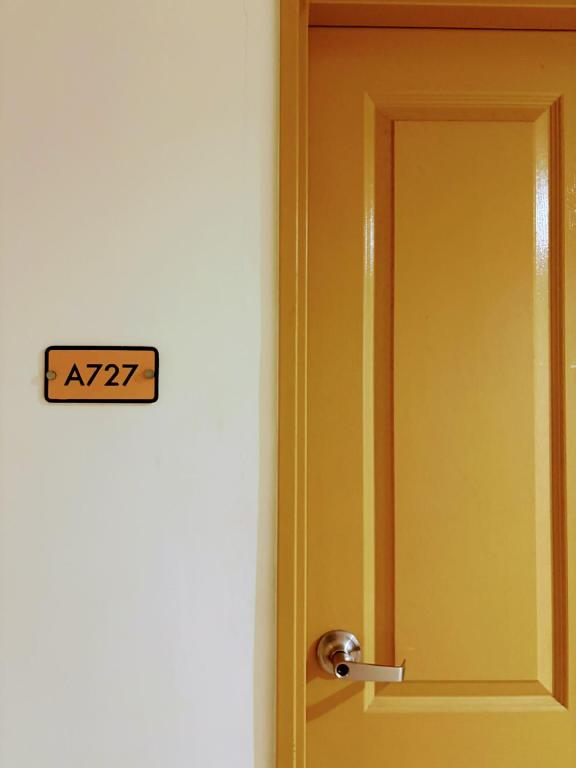 an open door with a sign that reads at at 727 Anabelle Residence at Marina Spatial Condominium in Dumaguete