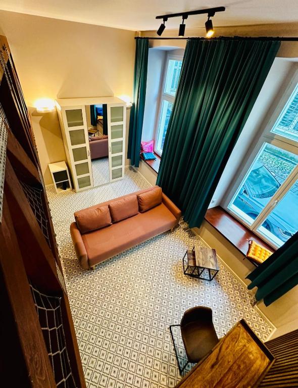 an overhead view of a living room with a couch at Refugium Lodziense II - Quiet luxury in the center of Lodz in Łódź