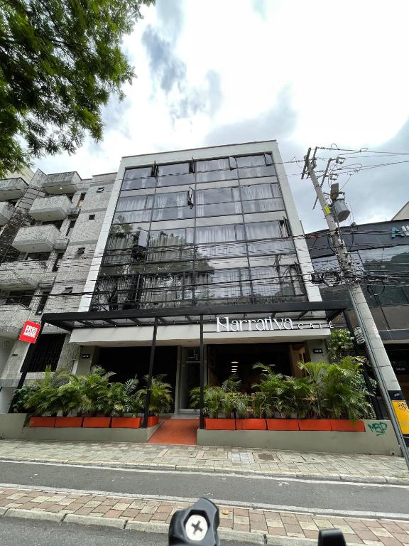 a large building with plants in front of it at Loft 32 Medellín Living in Medellín