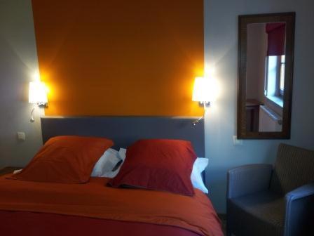 Postel nebo postele na pokoji v ubytování Hotel Le Moulin Simonis
