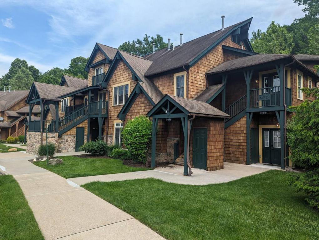 a large house with a gambrel roof at Country Chic New 2 Bed 2 Bath in Vernon Township