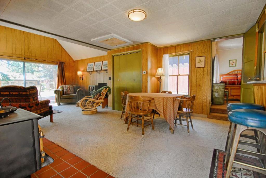 a living room with a table and chairs at McCarthy Place in Tahoe Vista
