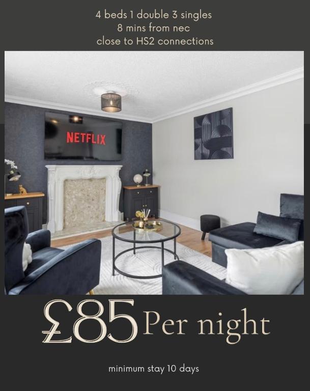 a poster of a living room with a couch and a table at Sarc Properties in Kingshurst
