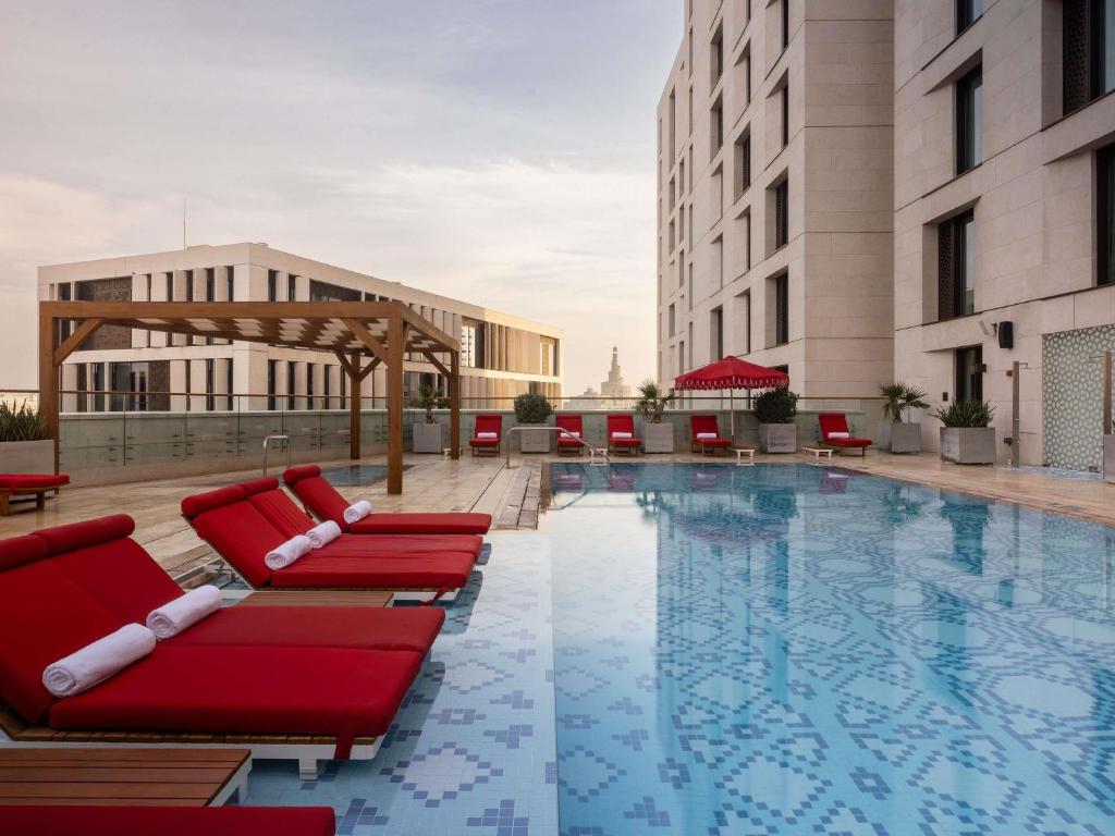 Alwadi Hotel Doha exterior and city view