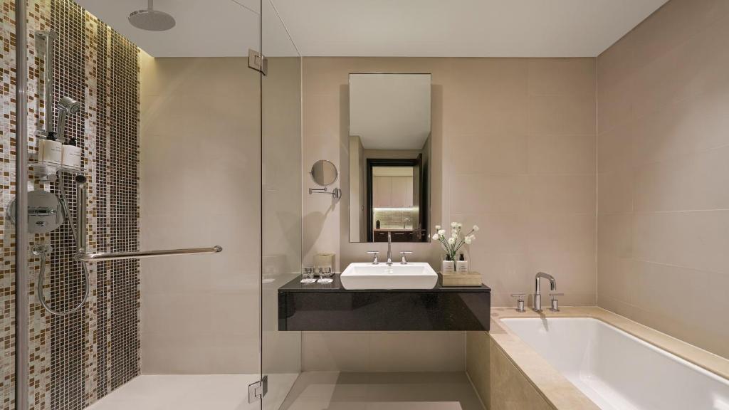 Two-Bedroom King Suite with Two Single Beds and City View
