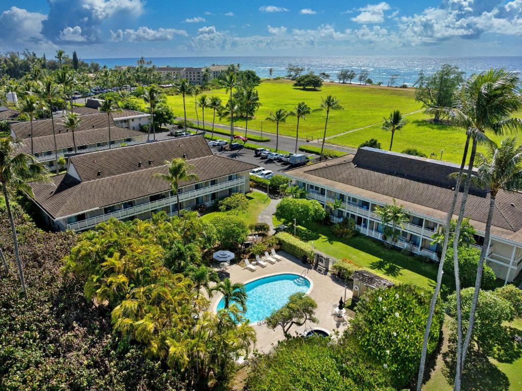 an aerial view of a resort with a swimming pool at Plantation Hale Suites in Kapaa