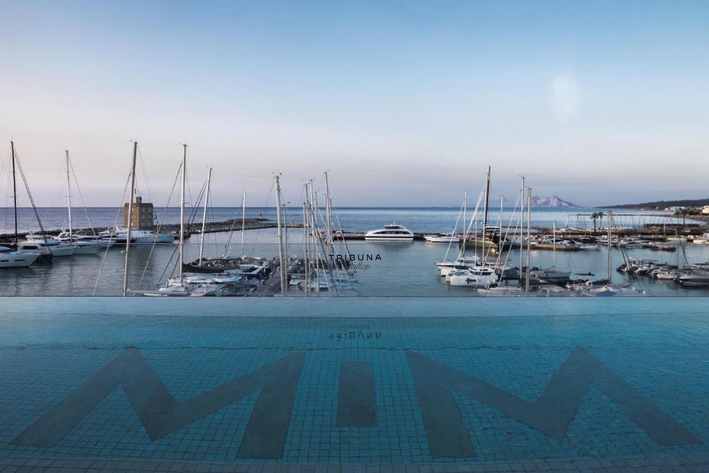 a view of a marina with boats in the water at MiM Sotogrande member of Meliá Collection in Sotogrande