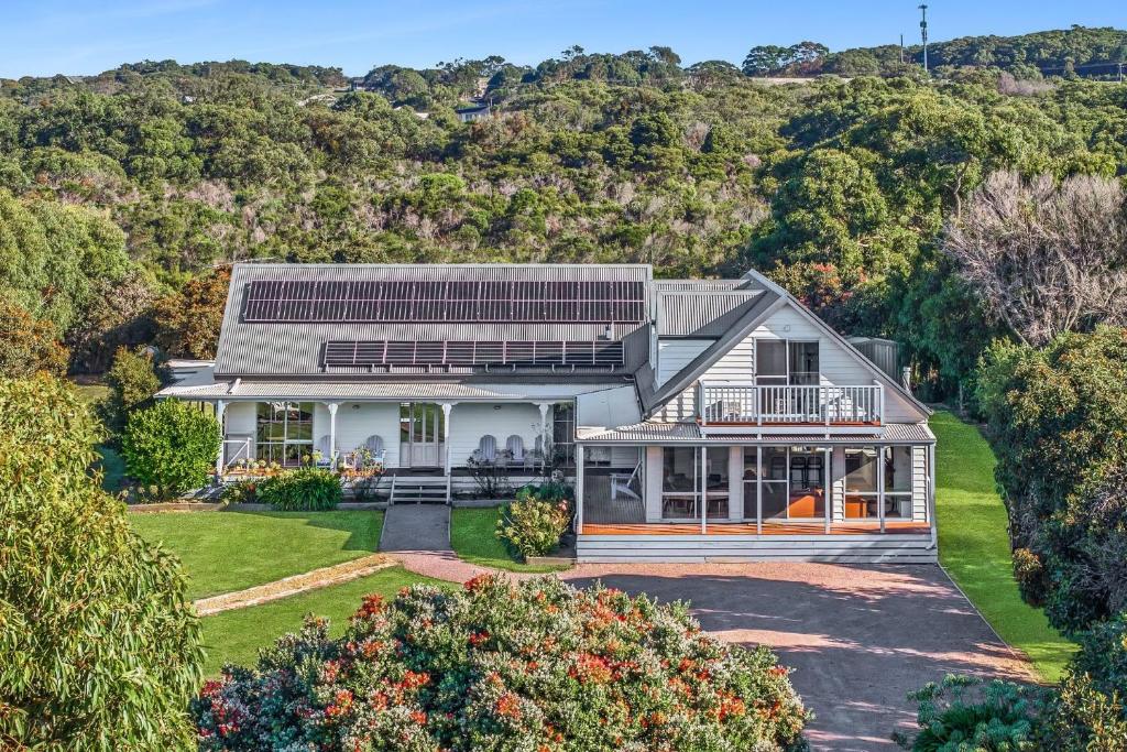 an aerial view of a house with a hill at The Great Escape in Marengo