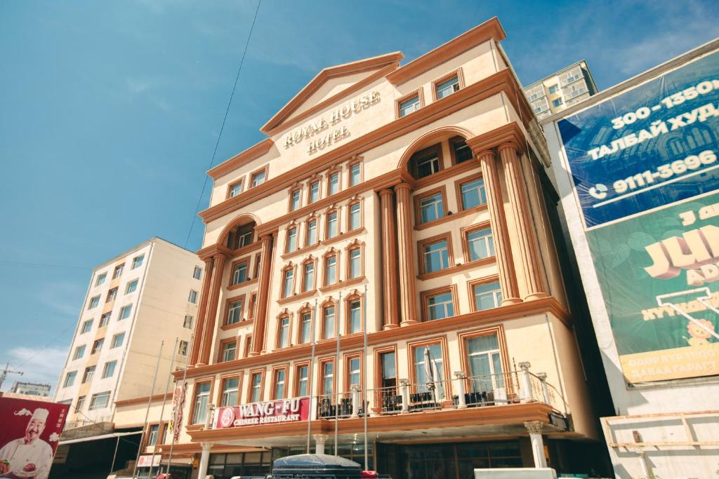 a large building in the middle of a city at Royal House Hotel 2 in Ulaanbaatar