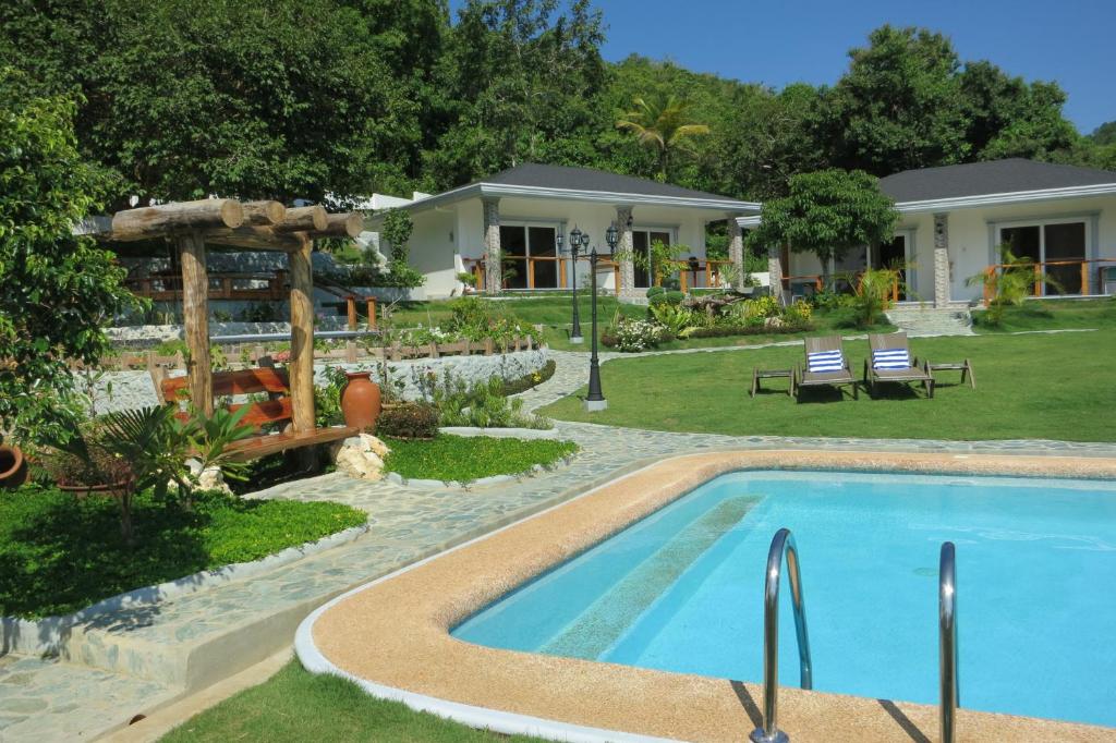 Kolam renang di atau dekat dengan Garden Bungalows Resort