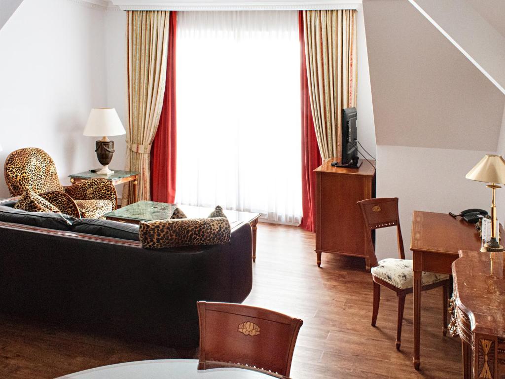 Posezení v ubytování DORMERO Hotel Halle