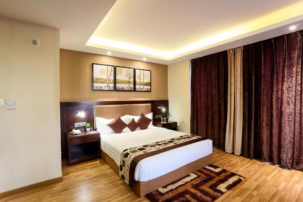 Postel nebo postele na pokoji v ubytování Delta Suites - The Soothing Luxury