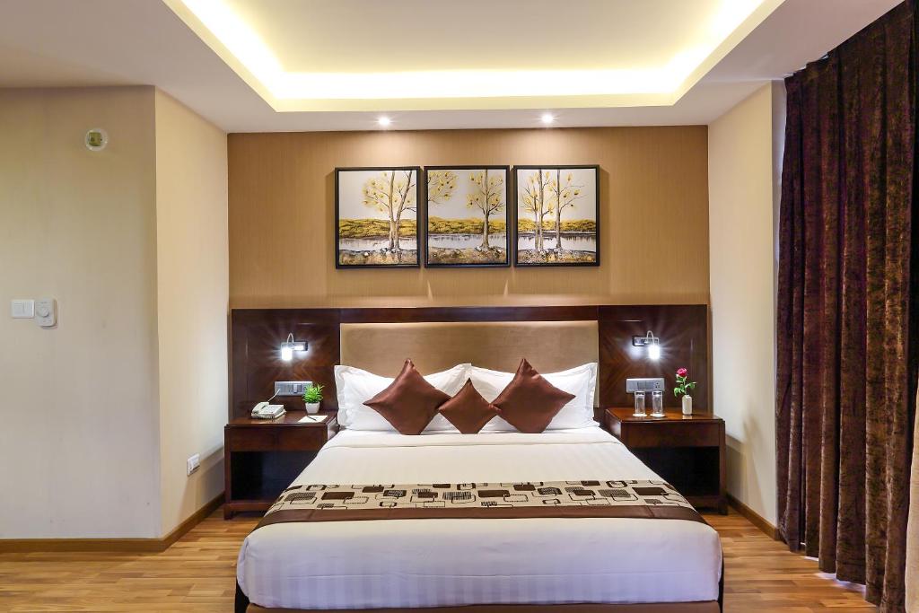 Postel nebo postele na pokoji v ubytování Delta Suites - The Soothing Luxury